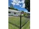A spacious backyard featuring well maintained chain link fence at 8320 Sw 108Th Place Rd, Ocala, FL 34481