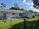 Spacious backyard with secure fencing and well-kept lawn at 8320 Sw 108Th Place Rd, Ocala, FL 34481