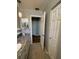 Bathroom featuring a granite countertop and decorative shelving at 8320 Sw 108Th Place Rd, Ocala, FL 34481