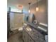 Bathroom featuring a granite countertop and decorative shelving at 8320 Sw 108Th Place Rd, Ocala, FL 34481