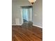 Open floor plan highlighting hardwood floors and seamless flow to other areas at 8320 Sw 108Th Place Rd, Ocala, FL 34481