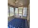 Bright and airy patio with neutral decor and large windows offering lots of natural light at 8320 Sw 108Th Place Rd, Ocala, FL 34481