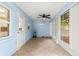 Enclosed back porch features tile floors, lots of light and a mini-split A/C system at 8400 Sw 90Th St # C, Ocala, FL 34481
