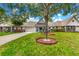 A charming single-story home with a garage, a manicured lawn, and inviting front porch at 8400 Sw 90Th St # C, Ocala, FL 34481