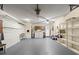 The spacious garage features a washer, dryer, shelving and lots of extra room at 8400 Sw 90Th St # C, Ocala, FL 34481