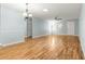 Well-lit living room featuring hardwood floors and a neutral color palette for a clean and modern aesthetic at 8400 Sw 90Th St # C, Ocala, FL 34481