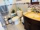Cozy bathroom featuring decorative tile accent wall, toilet, and single sink vanity at 8547 Sw 106Th Pl, Ocala, FL 34481