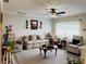 Bright and airy living room with hardwood floors, comfortable seating, and stylish decor at 8547 Sw 106Th Pl, Ocala, FL 34481