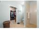 Bright bathroom featuring a walk-in closet, shower, and toilet at 8566 Sw 83Rd Loop, Ocala, FL 34481