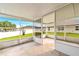 Enclosed patio offers protection with a view of the landscape at 10151 Sw 41St Ter, Ocala, FL 34476