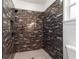 Luxurious walk-in shower with custom tiling, offering a spa-like experience at 13741 Sw 81St Cir, Ocala, FL 34473