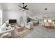 Bright, open-concept living area featuring a spacious layout, marble floors, and modern finishes at 13741 Sw 81St Cir, Ocala, FL 34473
