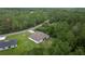 Aerial of home showing fenced-in backyard and covered patio at 144 Malauka Pass, Ocklawaha, FL 32179