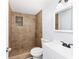 Updated bathroom featuring tiled shower and modern fixtures at 14761 Sw 35Th Terrace Rd, Ocala, FL 34473