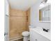 Updated bathroom featuring tiled shower with built-in bench and modern fixtures at 14761 Sw 35Th Terrace Rd, Ocala, FL 34473