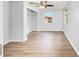 A large bedroom with a closet, a window, and light wood laminate flooring at 14761 Sw 35Th Terrace Rd, Ocala, FL 34473