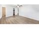 Bright bedroom with wood-look flooring and a ceiling fan at 14761 Sw 35Th Terrace Rd, Ocala, FL 34473