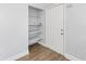 Entryway featuring modern gray flooring and a convenient storage closet at 14761 Sw 35Th Terrace Rd, Ocala, FL 34473