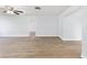Spacious living area featuring wood-look flooring and open floor plan at 14761 Sw 35Th Terrace Rd, Ocala, FL 34473