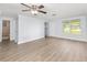 Inviting living area featuring wood-look flooring and natural light at 14761 Sw 35Th Terrace Rd, Ocala, FL 34473