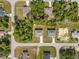 Overhead shot of the house and neighborhood illustrates layout and privacy at 15212 Sw 27Th Ct, Ocala, FL 34473