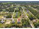 A wide aerial view showcasing the property's location within a vast residential community at 15212 Sw 27Th Ct, Ocala, FL 34473