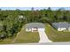 A beautiful aerial view of a well-maintained home featuring a large yard at 15212 Sw 27Th Ct, Ocala, FL 34473