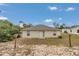 The backyard has a lawn and a sliding door that provides access to the home's interior at 15711 Sw 52Nd Avenue Rd, Ocala, FL 34473