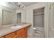 A bathroom featuring a single sink vanity and a tub with shower at 15711 Sw 52Nd Avenue Rd, Ocala, FL 34473