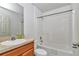 Bathroom featuring a single sink vanity with a tub and shower at 15711 Sw 52Nd Avenue Rd, Ocala, FL 34473