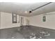 Functional garage with ample space, water heater, and access door enhances utility at 15711 Sw 52Nd Avenue Rd, Ocala, FL 34473