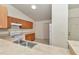 An open concept kitchen and breakfast bar featuring a tile floor at 15711 Sw 52Nd Avenue Rd, Ocala, FL 34473