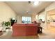 Inviting living room with neutral tones, comfortable seating, and plenty of natural light at 15822 Sw 16Th Avenue Rd, Ocala, FL 34473