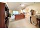 Bright living room with access to the enclosed lanai, seamlessly connecting indoor and outdoor spaces at 15822 Sw 16Th Avenue Rd, Ocala, FL 34473