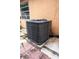 Close up of AC unit with exterior wall and window at 2563 Coral Ave, Kissimmee, FL 34741