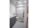 Bathroom featuring tiled floors, neutral walls, and a vanity with a sink at 2563 Coral Ave, Kissimmee, FL 34741