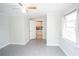 Comfortable bedroom with tile floors, light walls, and a window for natural light at 2563 Coral Ave, Kissimmee, FL 34741
