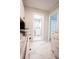 Galley style kitchen open to hall and bathroom at 2563 Coral Ave, Kissimmee, FL 34741