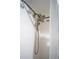 Shower features dual shower heads, white tile surround, and mosaic accents at 2563 Coral Ave, Kissimmee, FL 34741