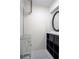 Bright walk-in closet features adjustable shelving, storage cube organizer, and an accent mirror at 2563 Coral Ave, Kissimmee, FL 34741