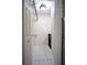 Bright walk-in closet with adjustable shelving and overhead light fixture, with a convenient storage cube organizer at 2563 Coral Ave, Kissimmee, FL 34741