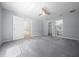Spacious bedroom showcasing new carpeting and generous open floor space at 26 Hemlock Terrace Dr, Ocala, FL 34472