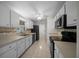Updated kitchen featuring sleek appliances and ample counter space at 26 Hemlock Terrace Dr, Ocala, FL 34472