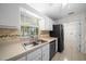 Bright kitchen boasts modern appliances and a double sink at 26 Hemlock Terrace Dr, Ocala, FL 34472