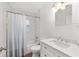 Updated bathroom featuring a shower-tub combo with a new vanity and modern fixtures at 2602 Ne 2Nd Ave, Ocala, FL 34470