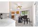 Charming kitchen with wooden cabinets, stainless steel appliances, and an adjacent dining area with a breakfast nook at 2602 Ne 2Nd Ave, Ocala, FL 34470