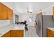Spacious kitchen includes stainless steel appliances, white marble counters, and wooden cabinets at 2602 Ne 2Nd Ave, Ocala, FL 34470