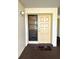 Welcoming front door entrance with security window and 'Welcome' mat at 3525 E Fort King St # 140, Ocala, FL 34470