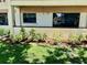 Condo building with front lawn and landscaping at 3525 E Fort King St # 145, Ocala, FL 34470