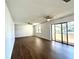 Spacious living room with dark wood floors and natural light at 3525 E Fort King St # 145, Ocala, FL 34470